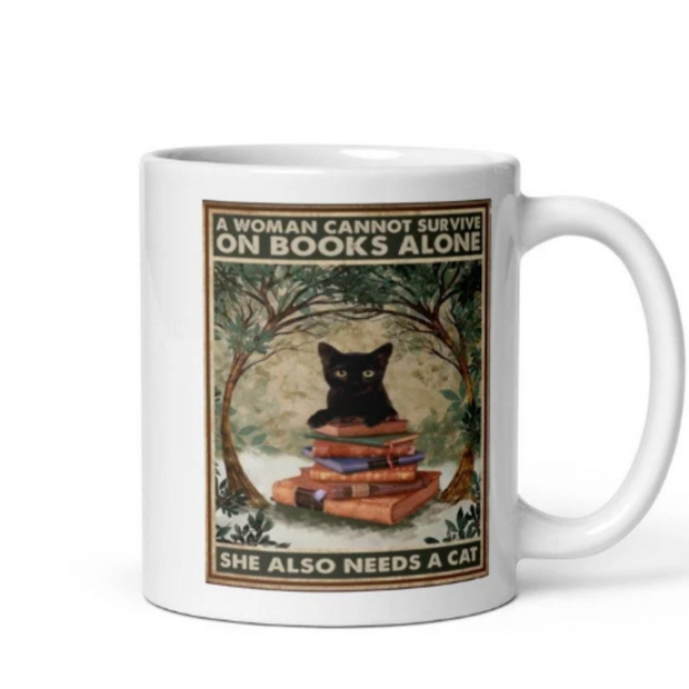 a women cannot survive on books alone she needs a cat,cat mug